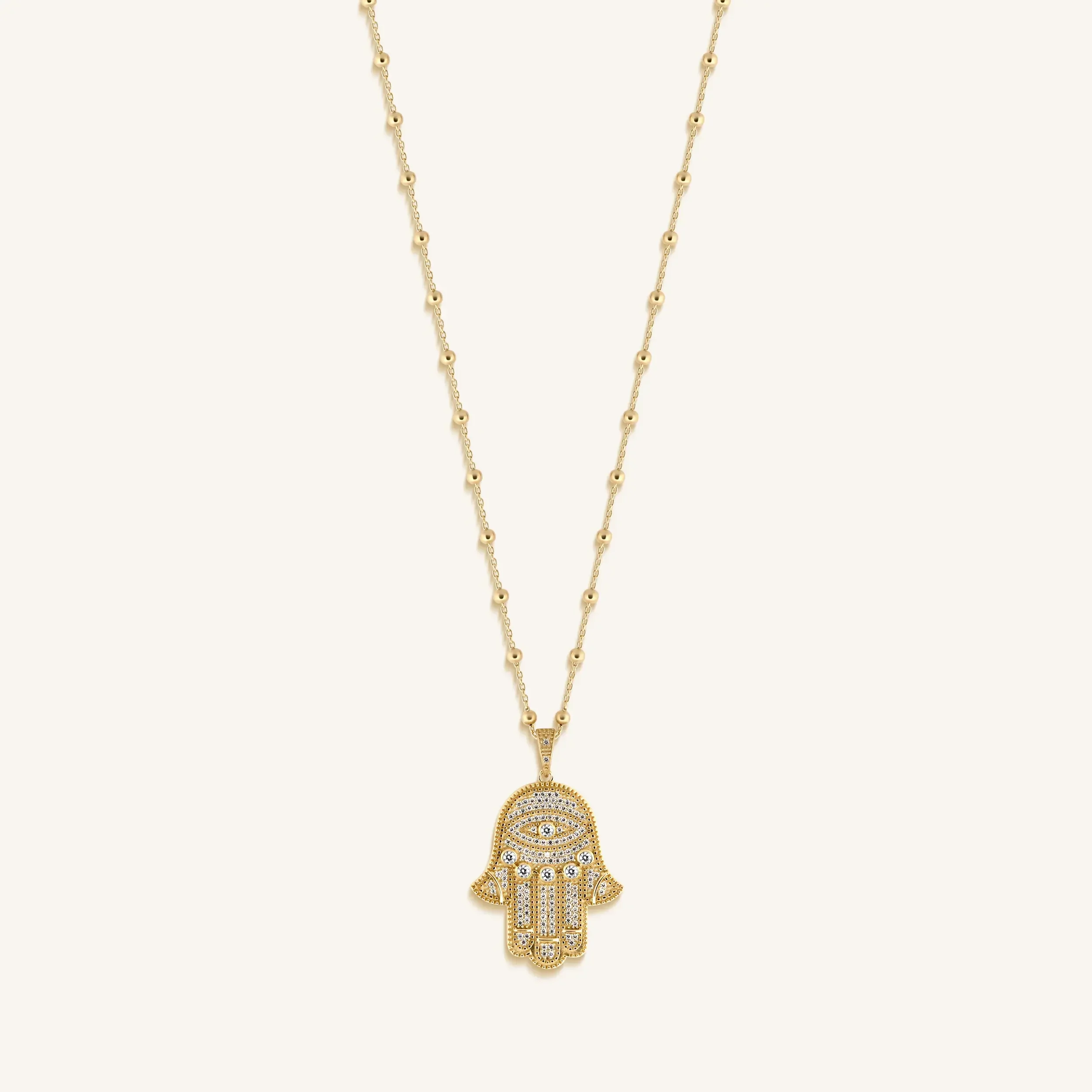 Inspired Action Gold Evil Eye & Hamsa Hand Necklace - Image 3
